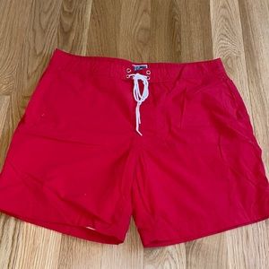 J Crew Men’s Red swim trunks. Size 33, lined with mesh, 1 back pocket w/ button